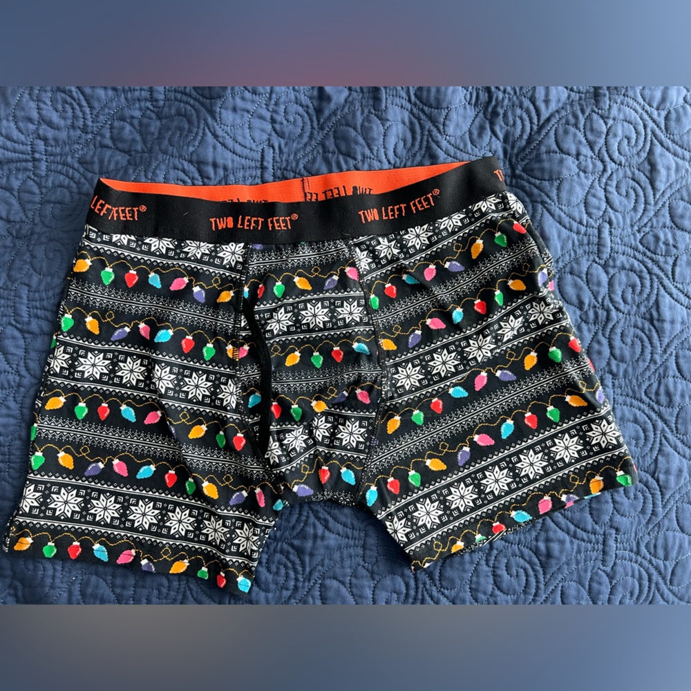 Size XL TWO LEFT FEET Christmas boxer briefs with Christmas lights & snowflakes.